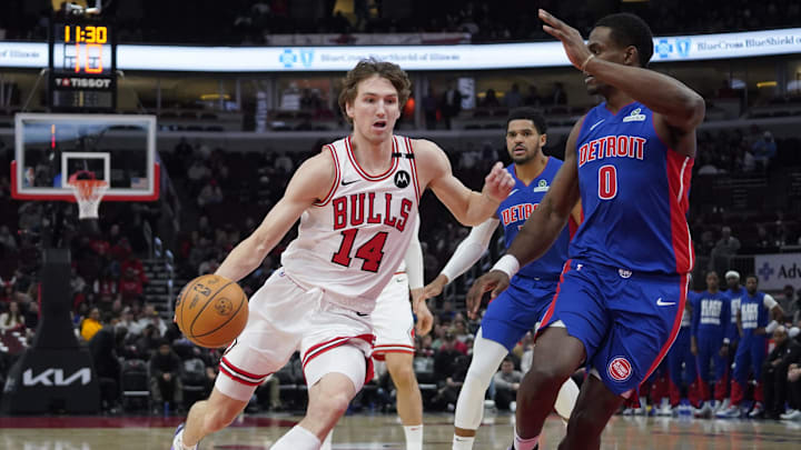 Feb 11, 2025; Chicago, Illinois, USA; Detroit Pistons center Jalen Duren (0) defends Chicago Bulls forward Matas Buzelis (14) during the first quarter at United Center. Mandatory Credit: David Banks-Imagn Images