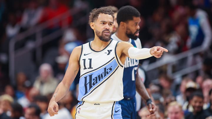 Nov 25, 2024; Atlanta, Georgia, USA; Atlanta Hawks guard Trae Young (11) in action against the Dallas Mavericks in the first quarter at State Farm Arena. Mandatory Credit: Brett Davis-Imagn Images
