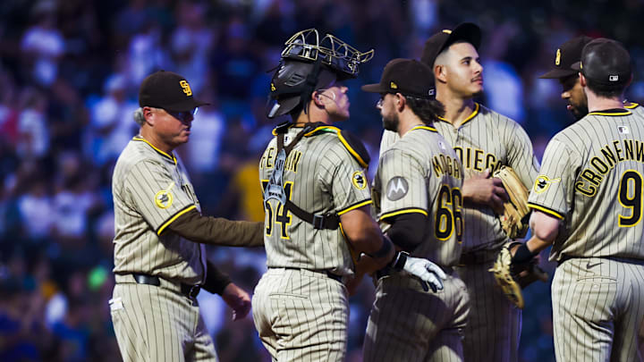 San Diego Padres manager Mike Shildt (8) takes the ball from relief pitcher David Morgan (66) during a fifth inning pitching change against the Seattle Mariners at T-Mobile Park on Aug 25, 2025.