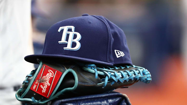 Sep 6, 2019; St. Petersburg, FL, USA; A detail view of a Tampa Bay Rays hat and glove at Tropicana Field. Mandatory Credit: Kim Klement-Imagn Images Sep 6, 2019; St. Petersburg, FL, USA; A detail view of a Tampa Bay Rays hat and glove at Tropicana Field. Mandatory Credit: Kim Klement-Imagn Images