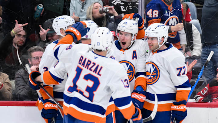 Feb 5, 2026; Newark, New Jersey, USA; New York Islanders center Bo Horvat (14) celebrates with teammates after scoring against the New Jersey Devils during the third period at Prudential Center. Mandatory Credit: John Jones-Imagn Images