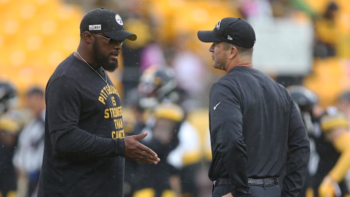 Oct 6, 2019; Pittsburgh, PA, USA; Pittsburgh Steelers head coach Mike Tomlin (left) and Baltimore Ravens head coach John Harbaugh (right) talk at mid-field before their teams play at Heinz Field. Mandatory Credit: Charles LeClaire-Imagn Images Oct 6, 2019; Pittsburgh, PA, USA; Pittsburgh Steelers head coach Mike Tomlin (left) and Baltimore Ravens head coach John Harbaugh (right) talk at mid-field before their teams play at Heinz Field. Mandatory Credit: Charles LeClaire-Imagn Images