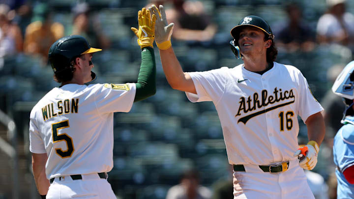 Jul 13, 2025; West Sacramento, California, USA; Athletics first baseman Nick Kurtz (16) celebrates with shortstop Jacob Wilson (5) after hitting a two-run home run against the Toronto Blue Jays during the fifth inning at Sutter Health Park. Mandatory Credit: Dennis Lee-Imagn Images