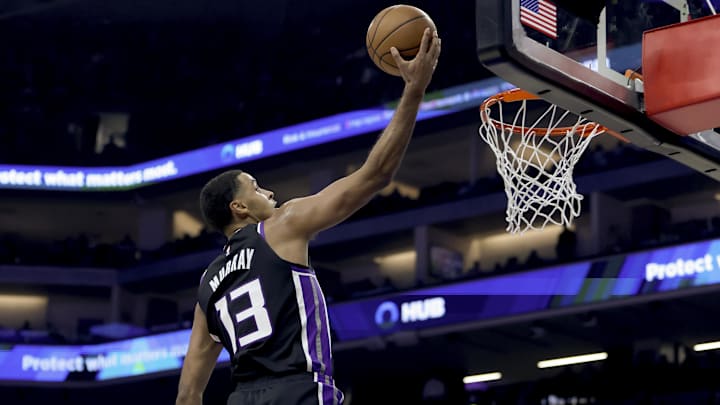 Nov 24, 2025; Sacramento, California, USA; Sacramento Kings forward Keegan Murray (13) goes up for a layup against the Minnesota Timberwolves during the second quarter at Golden 1 Center. Mandatory Credit: Dennis Lee-Imagn Images