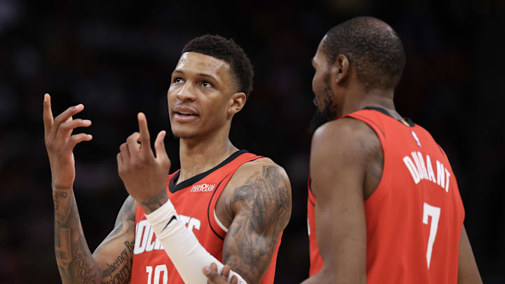 Jan 16, 2026; Houston, Texas, USA; Houston Rockets forward Jabari Smith Jr. (10) talks to forward Kevin Durant (7) during a Minnesota Timberwolves timeout in the second half at Toyota Center. Mandatory Credit: Thomas Shea-Imagn Images