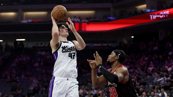 Mar 8, 2026; Sacramento, California, USA; Sacramento Kings center Maxine Raynaud (42) shoots over Chicago Bulls forward-center Guerschon Yabusele (28) during the first quarter at Golden 1 Center.