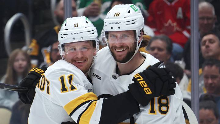 Mar 8, 2026; Pittsburgh, Pennsylvania, USA;  Boston Bruins center Casey Mittelstadt (11) congratulates center Pavel Zacha (18) on his second goal of the game against the Pittsburgh Penguins during the second period at PPG Paints Arena. Mandatory Credit: Charles LeClaire-Imagn Images