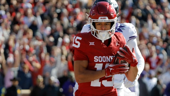 Nov 24, 2023; Norman, Oklahoma, USA; Oklahoma Sooners wide receiver Brenen Thompson (15) catches a touchdown pass against the TCU Horned Frogs at Gaylord Family-Oklahoma Memorial Stadium. Mandatory Credit: Bryan Terry-USA TODAY Sports Nov 24, 2023; Norman, Oklahoma, USA; Oklahoma Sooners wide receiver Brenen Thompson (15) catches a touchdown pass against the TCU Horned Frogs at Gaylord Family-Oklahoma Memorial Stadium. Mandatory Credit: Bryan Terry-USA TODAY Sports