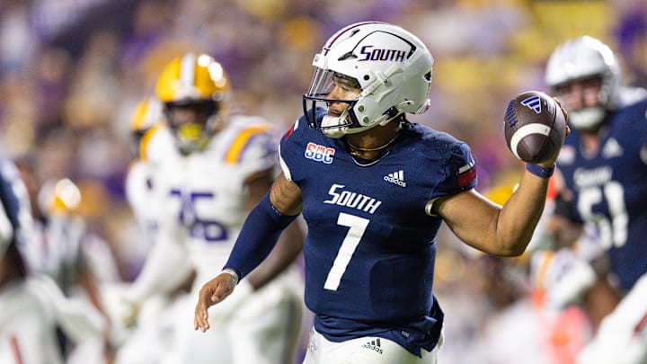 Sep 28, 2024; Baton Rouge, Louisiana, USA;  South Alabama Jaguars quarterback Gio Lopez (7) rolls out against the LSU Tigers during the second quarter at Tiger Stadium. 