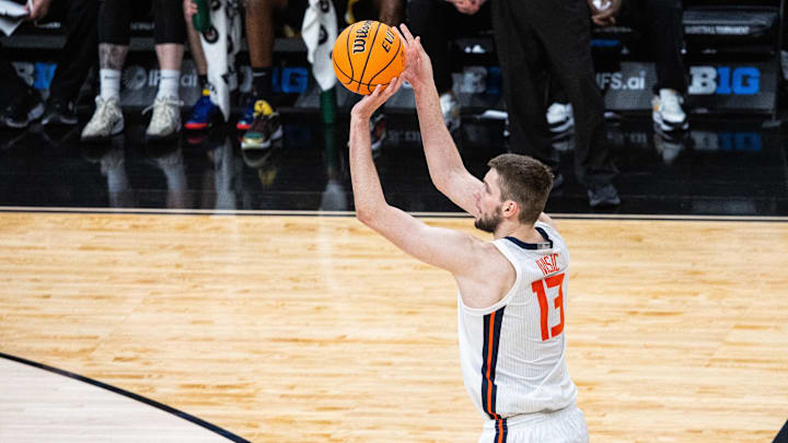 Mar 13, 2025; Indianapolis, IN, USA; Illinois Fighting Illini center Tomislav Ivisic (13) shoots the ball in the first half against the Iowa Hawkeyes at Gainbridge Fieldhouse. Mandatory Credit: Trevor Ruszkowski-Imagn Images