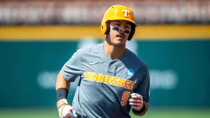 Tennessee's Hunter Ensley (9) runs the bases after hitting Tennessee's third home run of the first inning during game two of the NCAA baseball tournament Knoxville Super Regional between Tennessee and Evansville held at Lindsey Nelson Stadium on Saturday, June 8, 2024.
