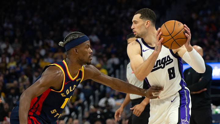 Mar 13, 2025; San Francisco, California, USA; Sacramento Kings guard Zach LaVine (8) looks to pass around Golden State Warriors forward Jimmy Butler III (10) during the second quarter at Chase Center. Mar 13, 2025; San Francisco, California, USA; Sacramento Kings guard Zach LaVine (8) looks to pass around Golden State Warriors forward Jimmy Butler III (10) during the second quarter at Chase Center.