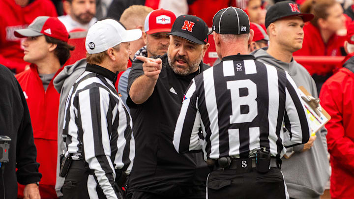 Nov 2, 2024; Lincoln, Nebraska, USA; Nebraska Cornhuskers head coach Matt Rhule talks with officials during the second quarter against the UCLA Bruins at Memorial Stadium. Mandatory Credit: Dylan Widger-Imagn Images