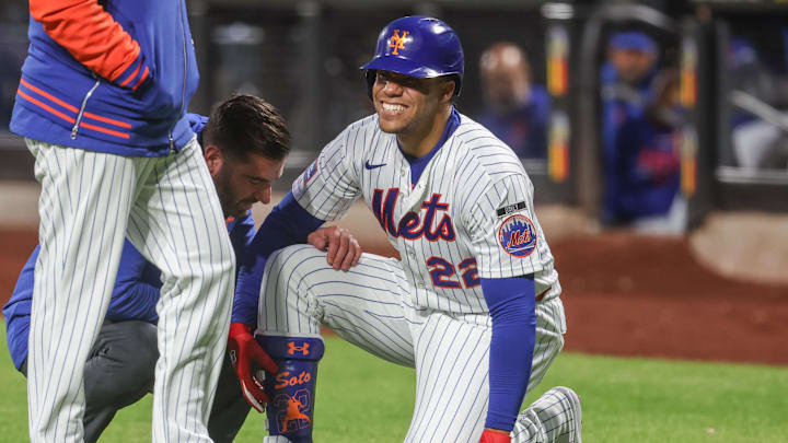 May 13, 2026; New York City, New York, USA;  New York Mets designated hitter Juan Soto (22) reacts after fouling a ball off of his foot in the third inning against the Detroit Tigers at Citi Field. Mandatory Credit: Wendell Cruz-Imagn Images