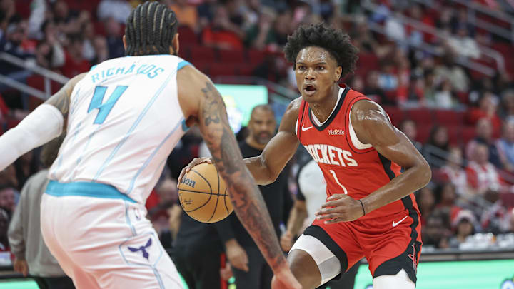 Oct 23, 2024; Houston, Texas, USA; Houston Rockets forward Amen Thompson (1) in action during the game against the Charlotte Hornets at Toyota Center. Mandatory Credit: Troy Taormina-Imagn Images