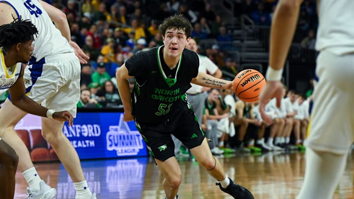 North Dakota Fighting Hawks guard Treysen Eaglestaff (52) moves the ball on Friday, March 7, 2025, at Denny Sanford Premier Center in Sioux Falls, S.D.