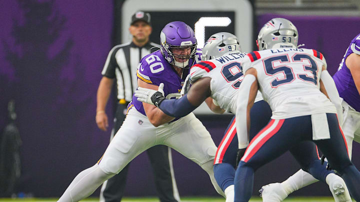 Aug 16, 2025; Minneapolis, Minnesota, USA; Minnesota Vikings guard Joe Huber (60) blocks New England Patriots defensive end Milton Williams (97) in the first quarter at U.S. Bank Stadium. Mandatory Credit: Brad Rempel-Imagn Images