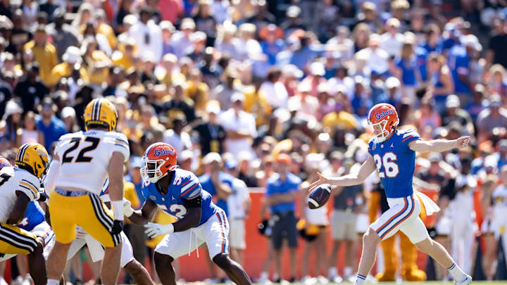 Florida Gators punter Jeremy Crawshaw (26) punts the ball during the first half against the Missouri Tigers at Steve Spurrier Field at Ben Hill Griffin Stadium in Gainesville, FL on Saturday, October 8, 2022. [Matt Pendleton/Gainesville Sun]

Ncaa Football Florida Gators Vs Missouri Tigers