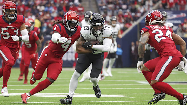 Nov 26, 2023; Houston, Texas, USA; Jacksonville Jaguars wide receiver Christian Kirk (13) runs with