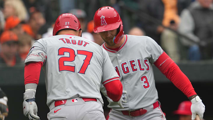 Mar 28, 2024; Baltimore, Maryland, USA; Los Angeles Angels outfielder Mike Trout (27) greeted by outfielder Taylor Ward (3) after connecting on a solo home run in the first inning against the Baltimore Orioles at Oriole Park at Camden Yards. Mandatory Credit: Mitch Stringer-Imagn Images Mar 28, 2024; Baltimore, Maryland, USA; Los Angeles Angels outfielder Mike Trout (27) greeted by outfielder Taylor Ward (3) after connecting on a solo home run in the first inning against the Baltimore Orioles at Oriole Park at Camden Yards. Mandatory Credit: Mitch Stringer-Imagn Images