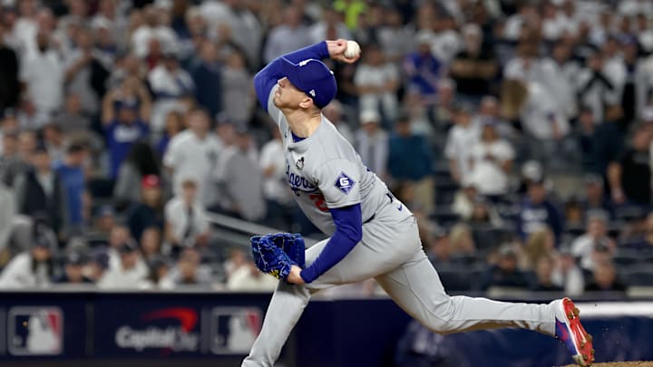 Oct 30, 2024; New York, New York, USA; Los Angeles Dodgers pitcher Walker Buehler (21) throws during the ninth inning against the New York Yankees in game five of the 2024 MLB World Series at Yankee Stadium. Mandatory Credit: Vincent Carchietta-Imagn Images