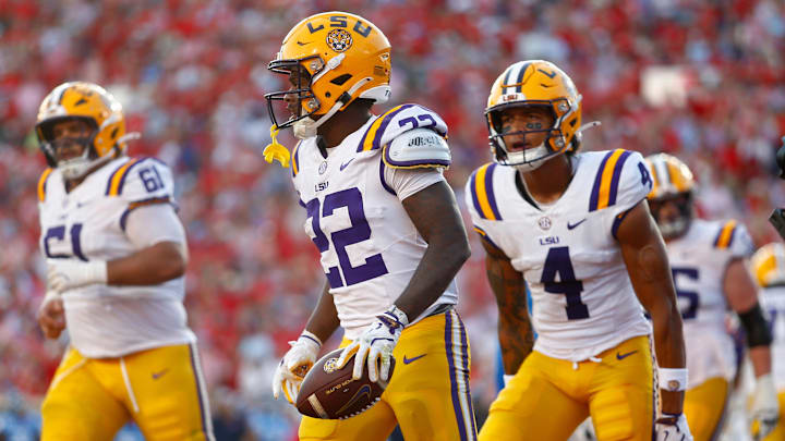 Sep 27, 2025; Oxford, Mississippi, USA; LSU Tigers running back Harlem Berry (22) reacts after a touchdown during the fourth quarter against the Mississippi Rebels at Vaught-Hemingway Stadium. Mandatory Credit: Petre Thomas-Imagn Images