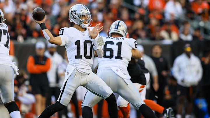 Nov 3, 2024; Cincinnati, Ohio, USA; Las Vegas Raiders quarterback Desmond Ridder (10) throws a pass against the Cincinnati Bengals in the second half at Paycor Stadium. Mandatory Credit: Katie Stratman-Imagn Images
