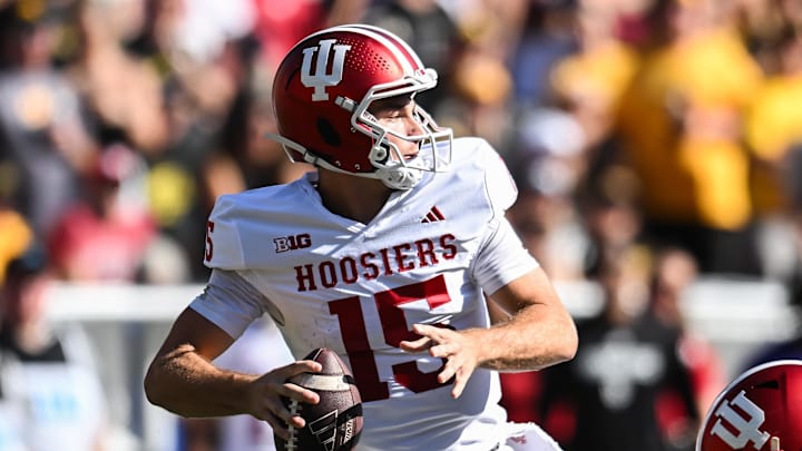 Sep 27, 2025; Iowa City, Iowa, USA; Indiana Hoosiers quarterback Fernando Mendoza (15) throws a pass against the Iowa Hawkeyes during the second quarter at Kinnick Stadium. Mandatory Credit: Jeffrey Becker-Imagn Images Sep 27, 2025; Iowa City, Iowa, USA; Indiana Hoosiers quarterback Fernando Mendoza (15) throws a pass against the Iowa Hawkeyes during the second quarter at Kinnick Stadium. Mandatory Credit: Jeffrey Becker-Imagn Images
