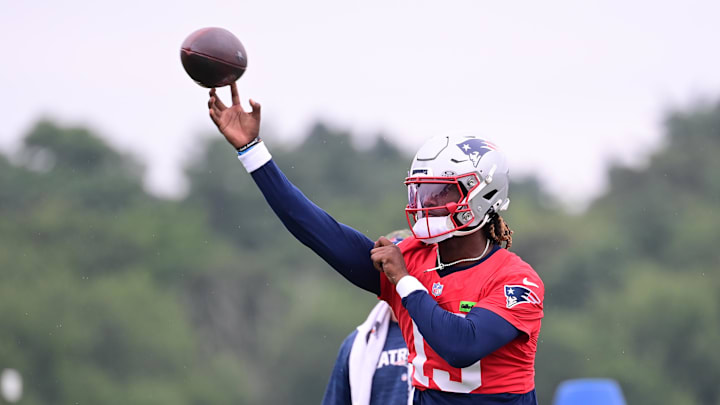 Jul 24, 2024; Foxborough, MA, USA;  New England Patriots quarterback Joe Milton III (19) throws a pass during training camp at Gillette Stadium. Mandatory Credit: Eric Canha-USA TODAY Sports