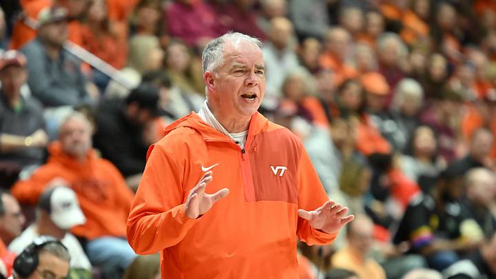 Feb 21, 2026; Blacksburg, Virginia, USA;  Virginia Tech Hokies head coach Mike Young gives instructions to his team during the first half at Cassell Coliseum. Mandatory Credit: Brian Bishop-Imagn Images