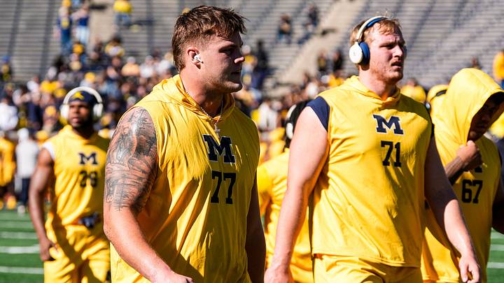 Michigan offensive lineman Blake Frazier (77) warms up ahead of the game between Michigan and Penn State at Michigan Stadium in Ann Arbor on Saturday, Oct. 17, 2026.