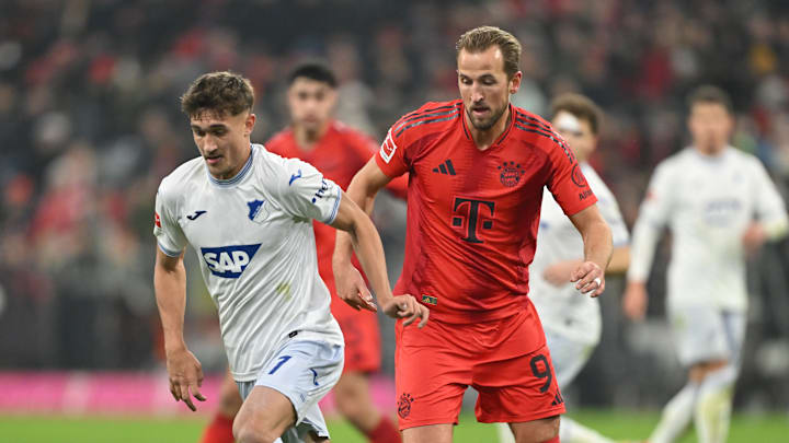 Tom Bischof in action against Bayern Munich at Allianz Arena on matchday 17 of the Bundesliga.