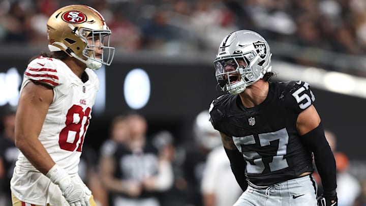 Las Vegas Raiders linebacker Drake Thomas (57) mocks San Francisco 49ers tight end Cameron Latu (81)