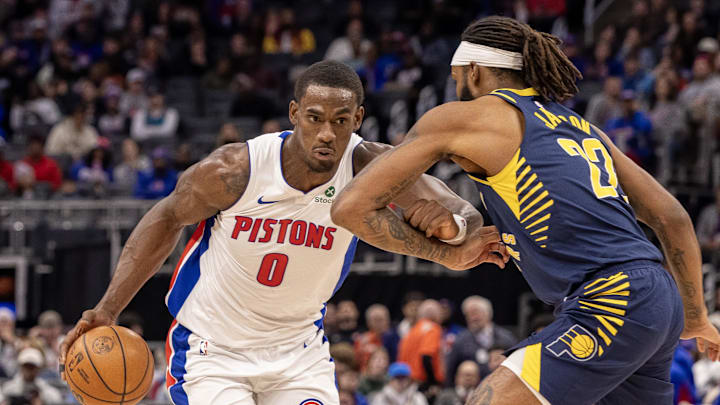 Nov 17, 2025; Detroit, Michigan, USA; Indiana Pacers forward Isaiah Jackson (22) defends against Detroit Pistons center Jalen Duren (0) during the first quarter at Little Caesars Arena. Mandatory Credit: David Reginek-Imagn Images