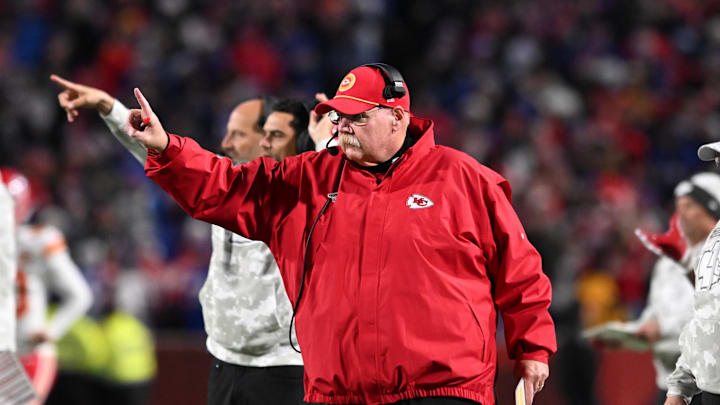 Nov 17, 2024; Orchard Park, New York, USA; Kansas City Chiefs head coach Andy Reid signals to go for one point after a touchdown  against the Buffalo Bills in the fourth quarter at Highmark Stadium. Mandatory Credit: Mark Konezny-Imagn Images