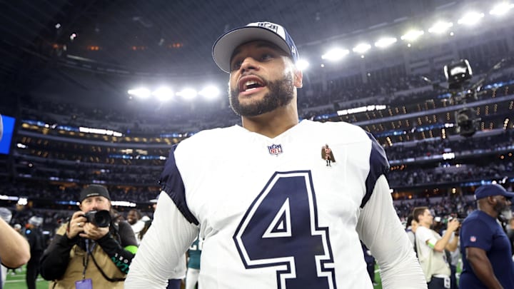 Dallas Cowboys quarterback Dak Prescott smiles on the field after the game against the Philadelphia Eagles. Dallas Cowboys quarterback Dak Prescott smiles on the field after the game against the Philadelphia Eagles.