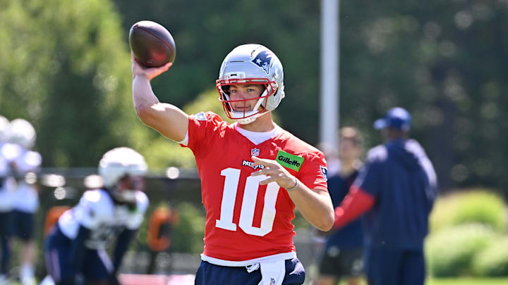 Jul 23, 2025; Foxborough, MA, USA; New England Patriots quarterback Drake Maye (10) throws a pass during training camp at Gillette Stadium. Mandatory Credit: Eric Canha-Imagn Images