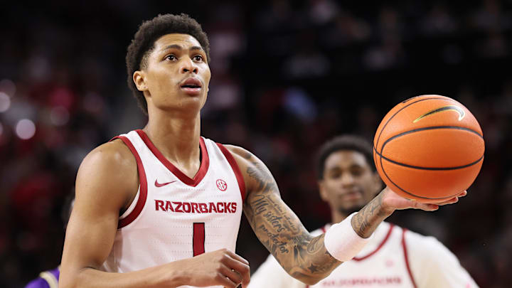 Dec 29, 2025; Fayetteville, Arkansas, USA; Arkansas Razorbacks guard Meleek Thomas (1) shoots a free throw int he first half against the James Madison Dukes at Bud Walton Arena. Arkansas won 103-74. Mandatory Credit: Nelson Chenault-Imagn Images