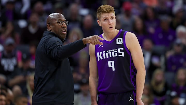 Oct 28, 2024; Sacramento, California, USA; Sacramento Kings head coach Mike Brown instructs guard Kevin Huerter (9) during the third quarter against the Portland Trail Blazers at Golden 1 Center. Mandatory Credit: Sergio Estrada-Imagn Images