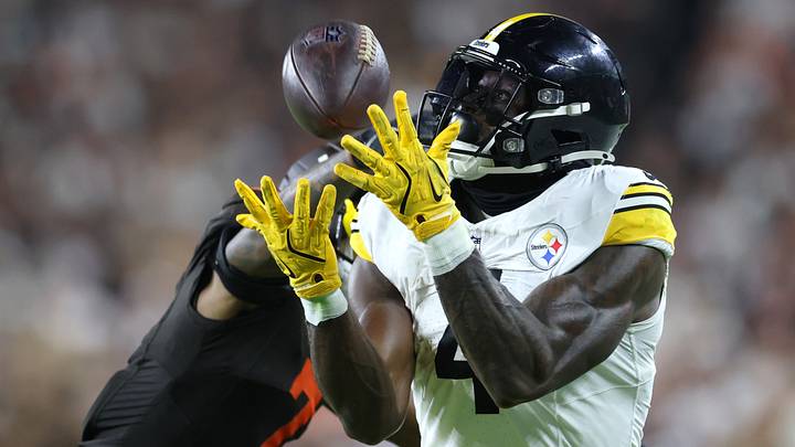 Oct 1, 2026; Cleveland, Ohio, USA;  Pittsburgh Steelers wide receiver DK Metcalf (4) makes a catch over Cleveland Browns cornerback Tyson Campbell (7) in the second half at Huntington Bank Field.  Mandatory Credit: Scott Galvin-Imagn Images