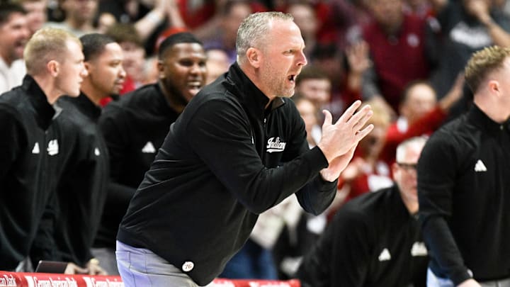 Nov 25, 2025; Bloomington, Indiana, USA; Indiana Hoosiers head coach Darian Devries claps his hands during the first half against the Kansas State Wildcats at Simon Skjodt Assembly Hall. Mandatory Credit: Robert Goddin-Imagn Images