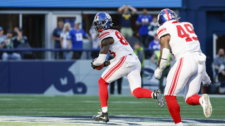 Oct 6, 2024; Seattle, Washington, USA; New York Giants wide receiver Bryce Ford-Wheaton (88) returns a blocked field goal for a touchdown against the Seattle Seahawks during the fourth quarter at Lumen Field. Mandatory Credit: Joe Nicholson-Imagn Images