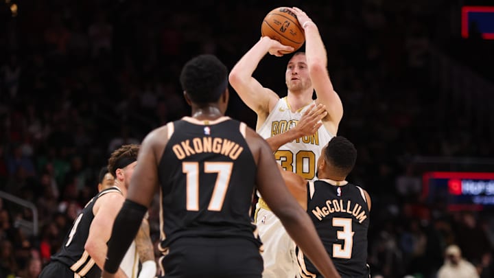 Jan 17, 2026; Atlanta, Georgia, USA; Boston Celtics forward Sam Hauser (30) shoots against the Atlanta Hawks in the fourth quarter at State Farm Arena. Mandatory Credit: Brett Davis-Imagn Images