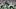 New York Jets wide receiver Garrett Wilson (5) runs with the ball against New England Patriots cornerbacks Marcus Jones (25) New York Jets wide receiver Garrett Wilson (5) runs with the ball against New England Patriots cornerbacks Marcus Jones (25)