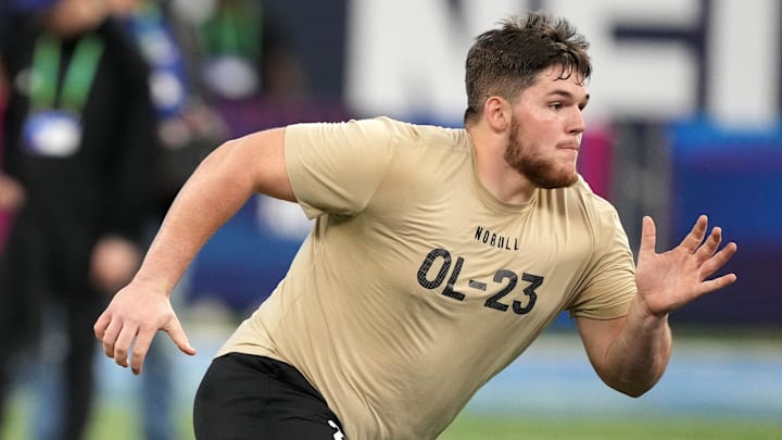 Mar 3, 2024; Indianapolis, IN, USA; West Virginia offensive lineman Zach Frazier (OL23) during the 2024 NFL Combine at Lucas Oil Stadium. Mandatory Credit: Kirby Lee-Imagn Images
