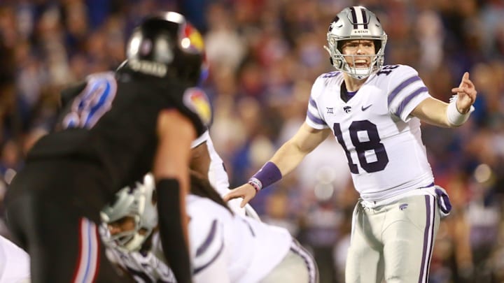 Kansas State senior quarterback Will Howard (18) calls a play during the third quarter of Saturday's