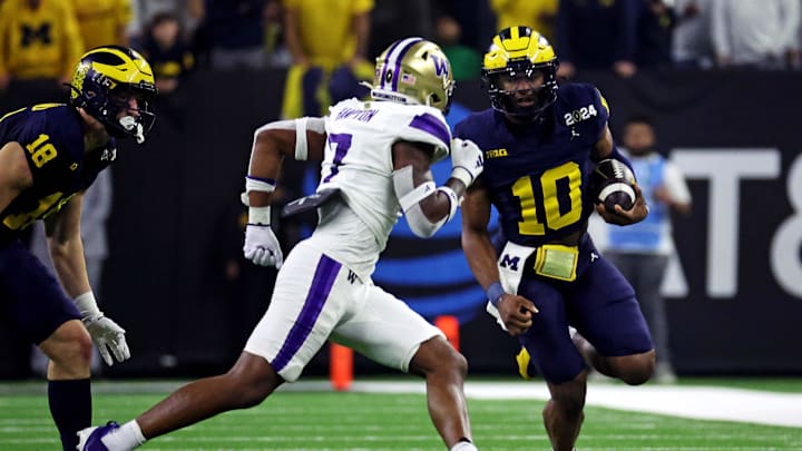 Jan 8, 2024; Houston, TX, USA; Michigan Wolverines quarterback Alex Orji (10) runs the ball against