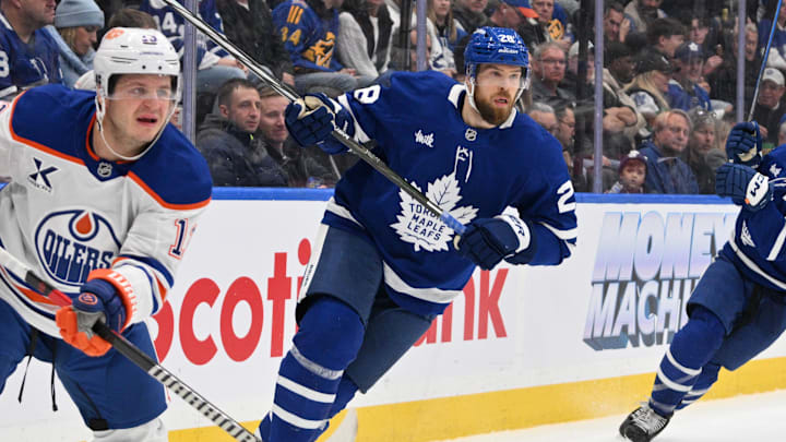 Nov 16, 2024; Toronto, Ontario, CAN;  Toronto Maple Leafs defenseman Jani Hakanpaa (28) pursues the play against the Edmonton Oilers in the second period at Scotiabank Arena. Mandatory Credit: Dan Hamilton-Imagn Images