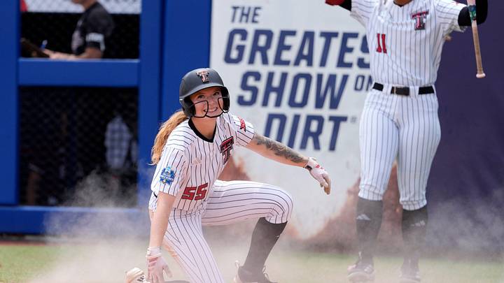 Texas Tech Kaitlyn Terry (55) celebrates after scoring a run in the fifth inning as Texas Tech gets a run-rule victory during a Women's College World Series softball game between the Texas Tech Red Raiders and the Mississippi State Bulldogs at Devon Park in Oklahoma City, Thursday, May 28, 2026. Texas Tech won 8-0. Texas Tech Kaitlyn Terry (55) celebrates after scoring a run in the fifth inning as Texas Tech gets a run-rule victory during a Women's College World Series softball game between the Texas Tech Red Raiders and the Mississippi State Bulldogs at Devon Park in Oklahoma City, Thursday, May 28, 2026. Texas Tech won 8-0.