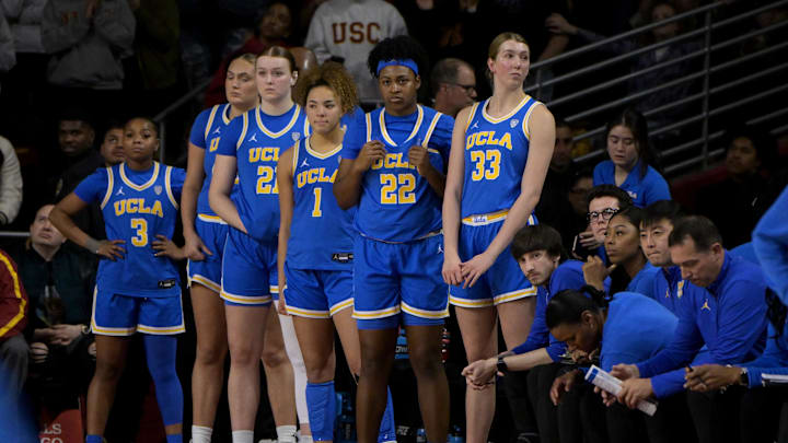 Jan 14, 2024; Los Angeles, California, USA; The UCLA Bruins watch their teammates on the court. Jan 14, 2024; Los Angeles, California, USA; The UCLA Bruins watch their teammates on the court.